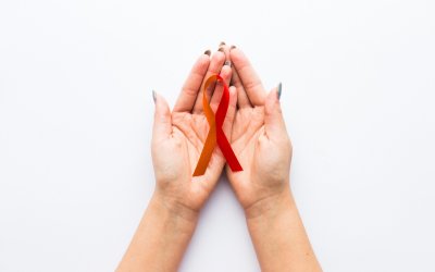 Dezembro Vermelho e Laranja: mês de combate às IST e conscientização do câncer de pele